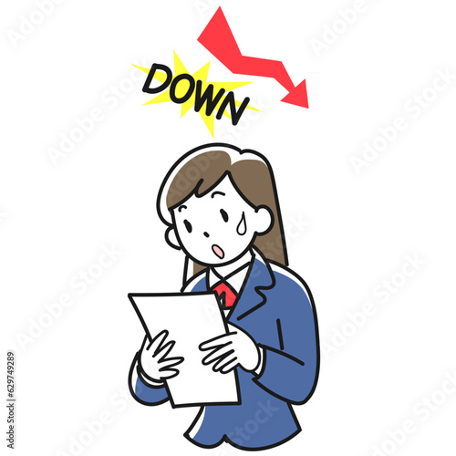 成績が下がってショックを受ける女子高生