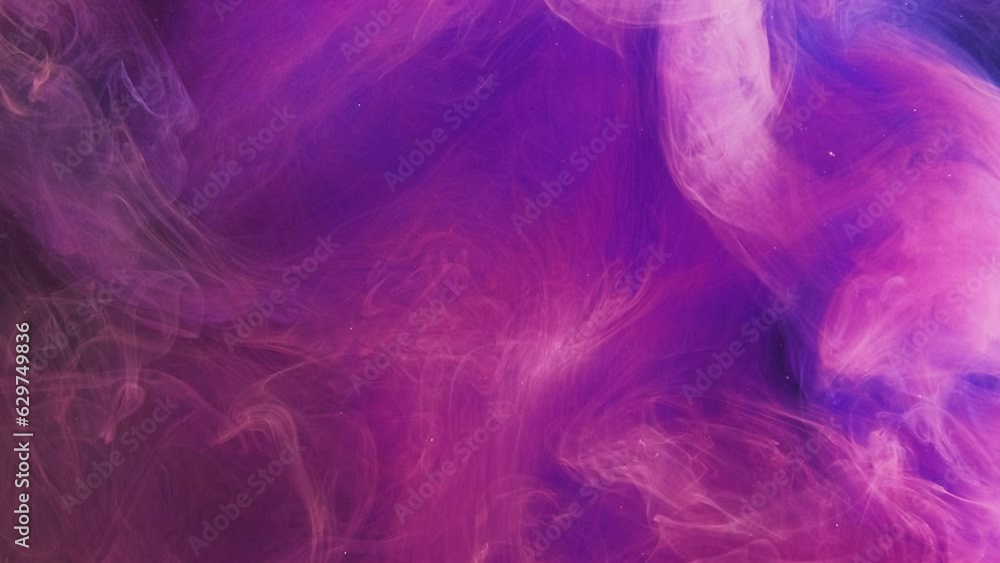 Paint water drop. Color fluid mix. Underwater splash. Vibrant neon pink blue glitter vapor cloud blend motion on dark abstract art background. Paint water drop. Color fluid mix. Underwater splash. Vibrant neon pink blue glitter vapor cloud blend motion on dark abstract art background.