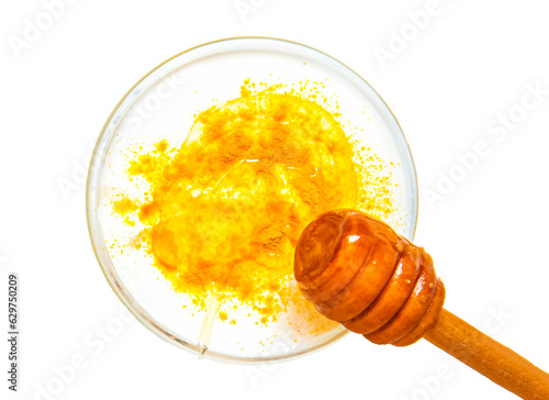 Natural face mask with turmeric powder and yogurt. Natural cosmetics isolated on white background. top view.