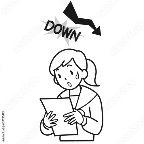成績が下がってショックを受ける女子高生