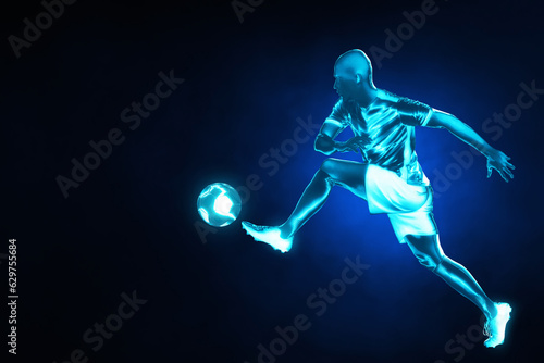 Soccer player on blue background