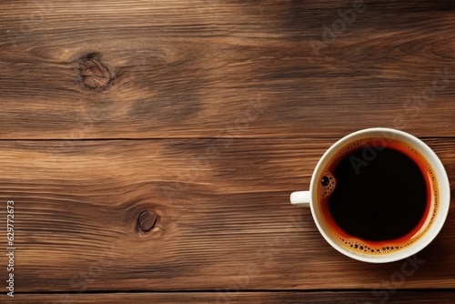 A cup of coffee on a rustic wooden table