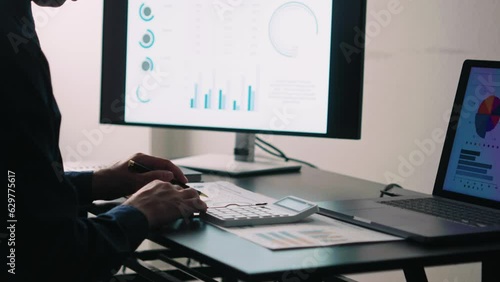 Wallpaper Mural Financial Businessman analyze the graph of the company's performance to create profits and growth, Market research reports and income statistics, Financial and Accounting concept. Torontodigital.ca