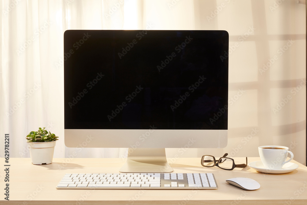 computer screen and keyboard on working table computer screen and keyboard on working table