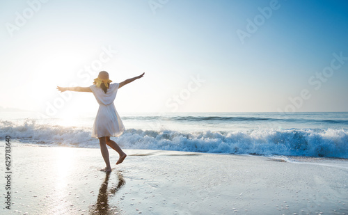 Young woman having fun at seaside
