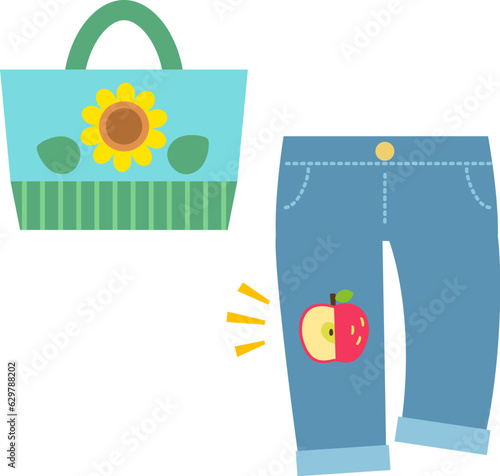 アップリケが付いたバッグとズボン