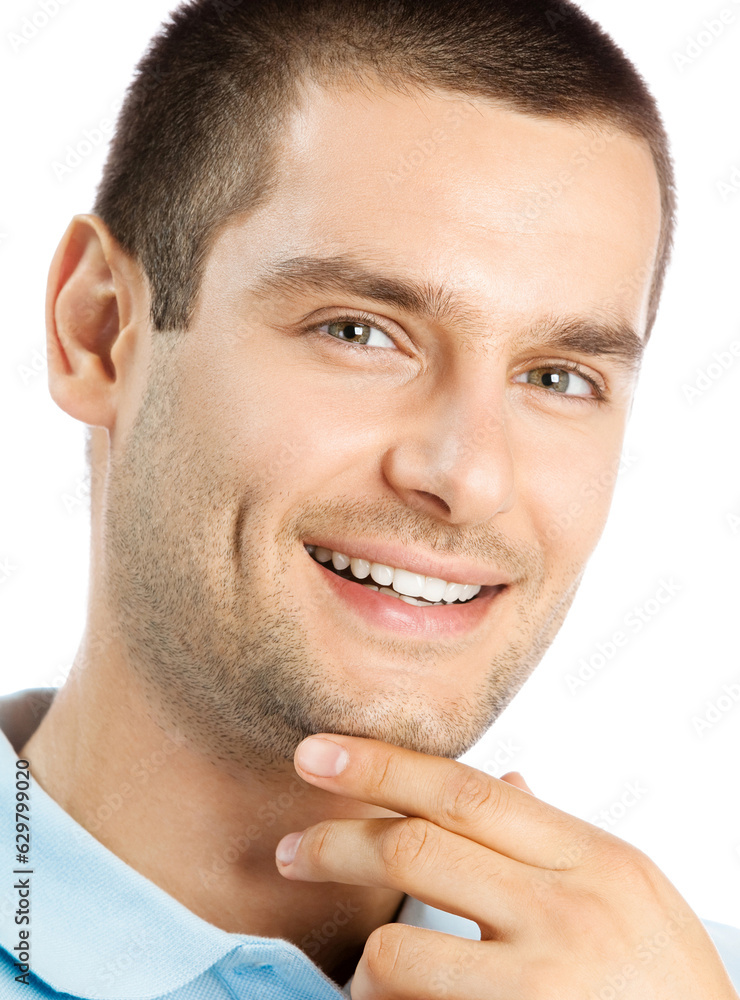 Obraz premium Cheerful thinking young man, isolated over white background