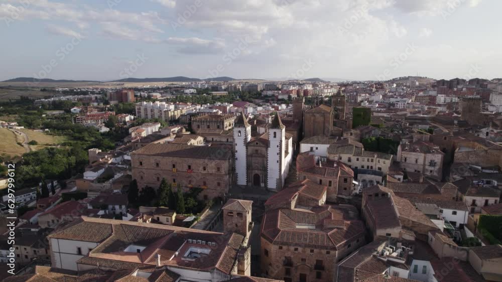 Wide frontal view of baroque-style church, cinematic aerial. Caceres, Spain Wide frontal view of baroque-style church, cinematic aerial. Caceres, Spain