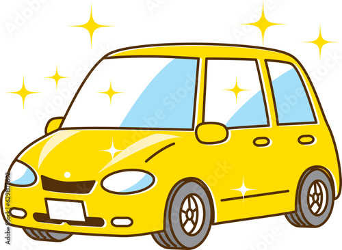 ピカピカに輝くかわいい黄色い自動車