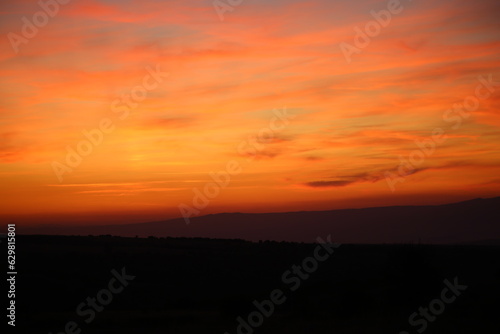 Red sunset and mountains silhouette