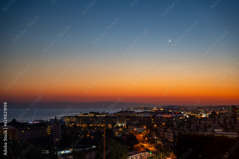 Beautiful sky after sunset at the Konakli city near Alanya by the Mediterranean Sea, Turkey