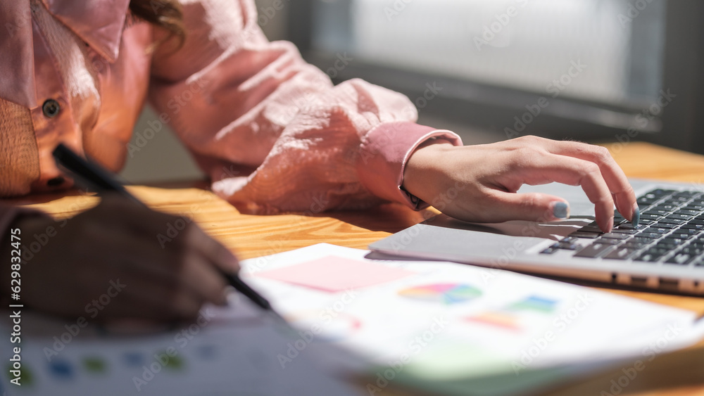 Close up view businesswoman hands typing on keyboard. Close up view businesswoman hands typing on keyboard.