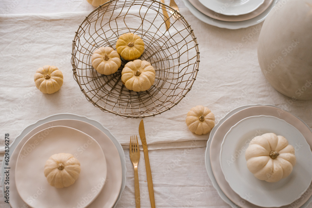 Autumn table setting with pumpkins. Decor about Thanksgiving