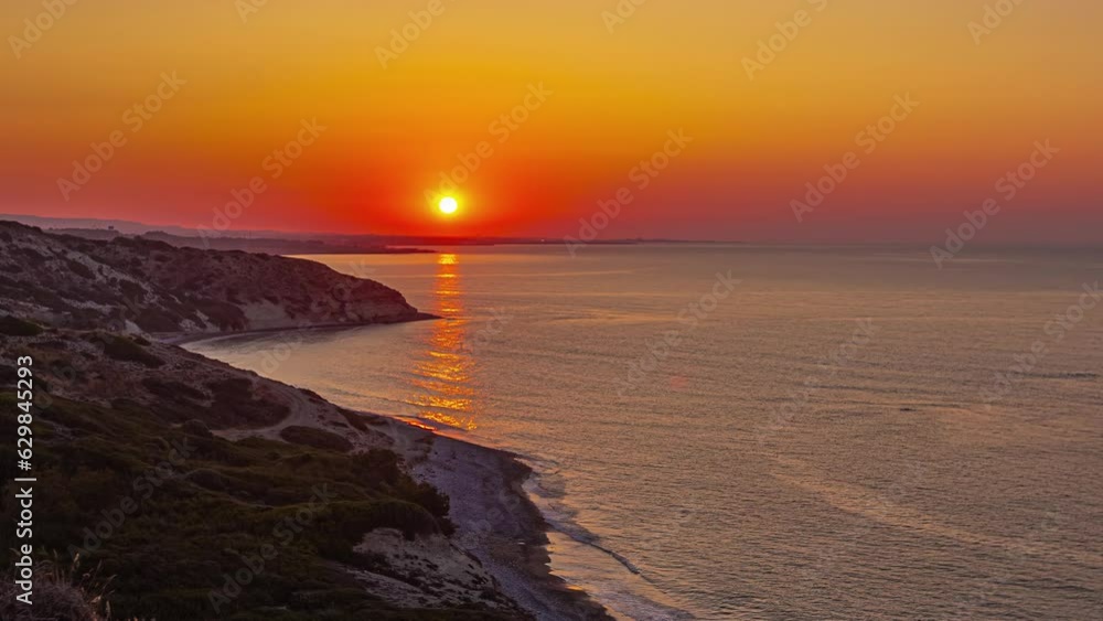 time lapse a fiery red horizon changes to yellow during a sunrise over the sea
time lapse a fiery red horizon changes to yellow during a sunrise over the sea
