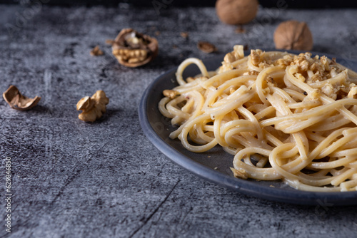 Spaghetti with walnut cream. Simple, nutritious and tasty dish suitable for those who follow a vegetarian diet.