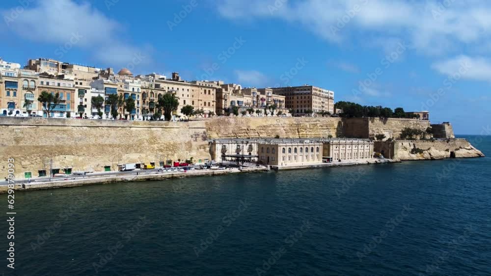 A breathtaking aerial view of the historic town of Malta, showcasing the stunning panorama of the Mediterranean Sea and the famous harbor A breathtaking aerial view of the historic town of Malta, showcasing the stunning panorama of the Mediterranean Sea and the famous harbor