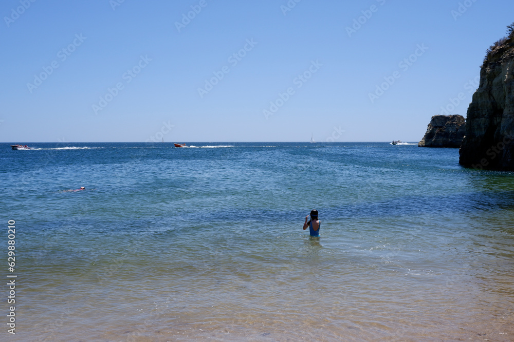 On a beach of Lagos, Portugal, the summer of 2023.