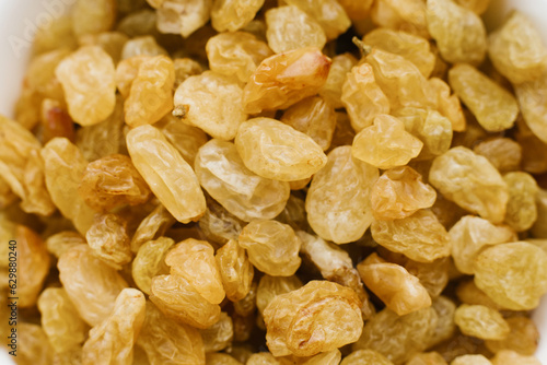 Yellow raisins close up