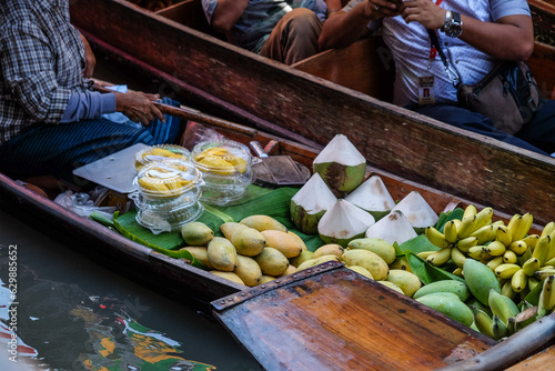 Fruit and local food sell on boat at floating  market photo