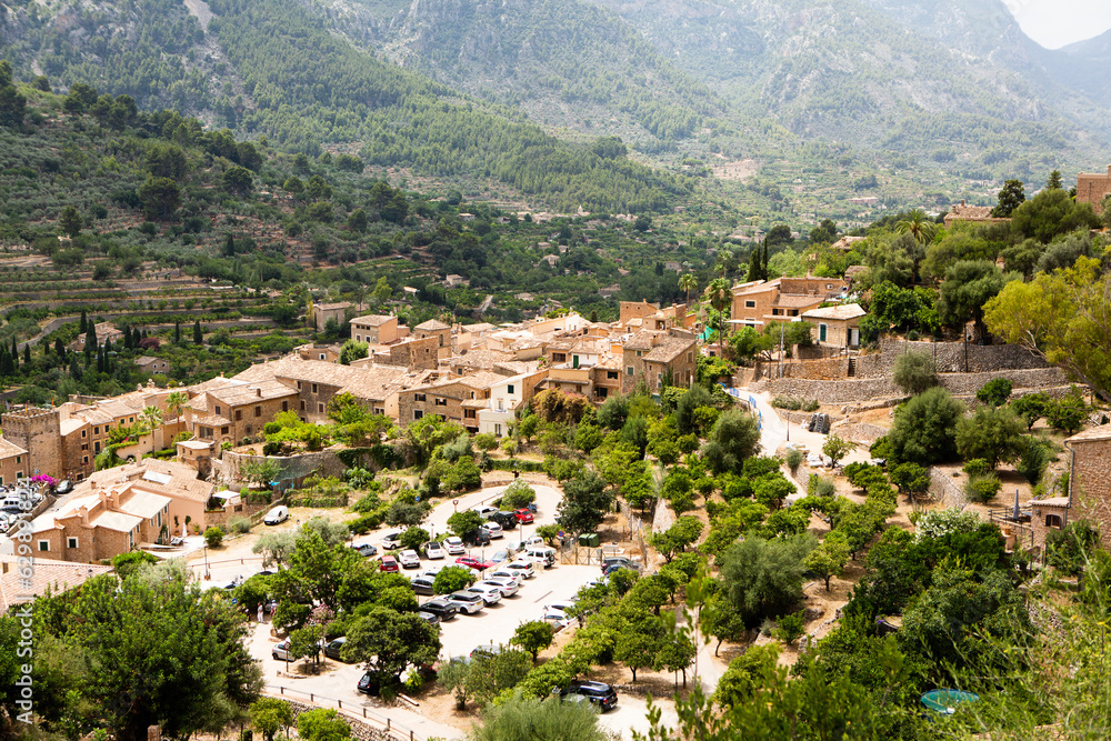 Fototapeta premium View of a medieval street in the Old Town of the picturesque Spanish-style village Fornalutx, Majorca or Mallorca island