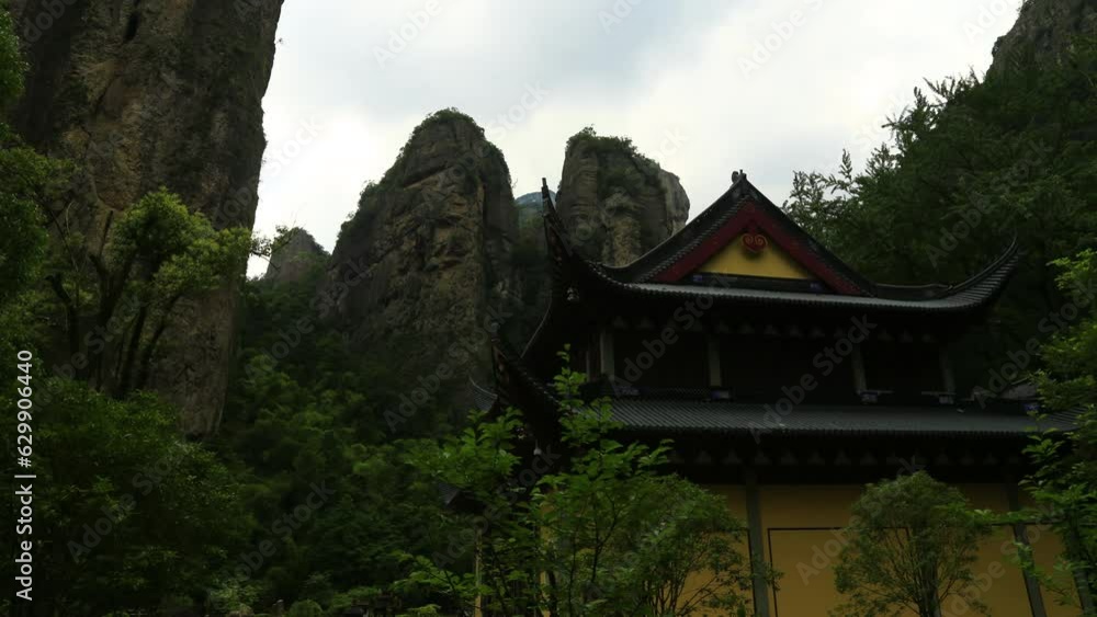 Temple in Yandang mountain time lapse.Yandang Mountain was named a world Geopark.Known at home and abroad for its unique peaks, rocks, waterfalls and ancient caves. Temple in Yandang mountain time lapse.Yandang Mountain was named a world Geopark.Known at home and abroad for its unique peaks, rocks, waterfalls and ancient caves.