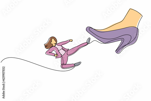 Single one line drawing young businesswoman kick giant foot stomp. Office worker doing flying kick to big high heels. Minimal metaphor concept. Continuous line draw design graphic vector illustration