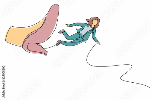 Single one line drawing businesswoman getting fired, flying through air after being kicked in the back. Minimalism metaphor concept. Modern continuous line draw design graphic vector illustration
