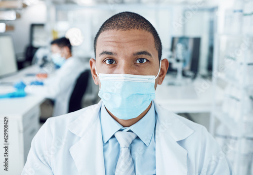 Portrait, mask and man in a laboratory, research and career with covid protection, medical and safety. Face cover, person and researcher with compliance, lab and scientist with serious professional