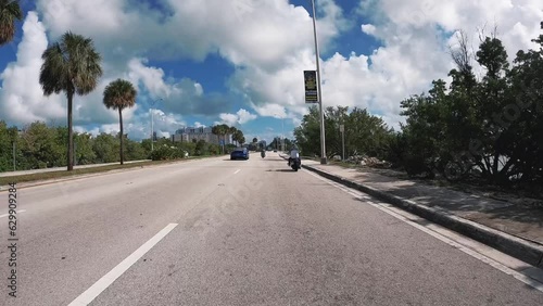 Driving POV, Coastal Highway, Miami Traffic. Super car and Motorbike