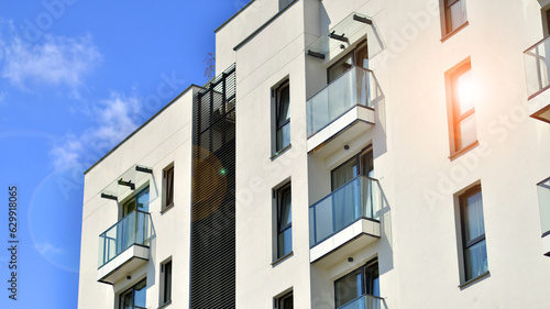 Modern apartment building in sunny day. Exterior, residential house facade. © Grand Warszawski