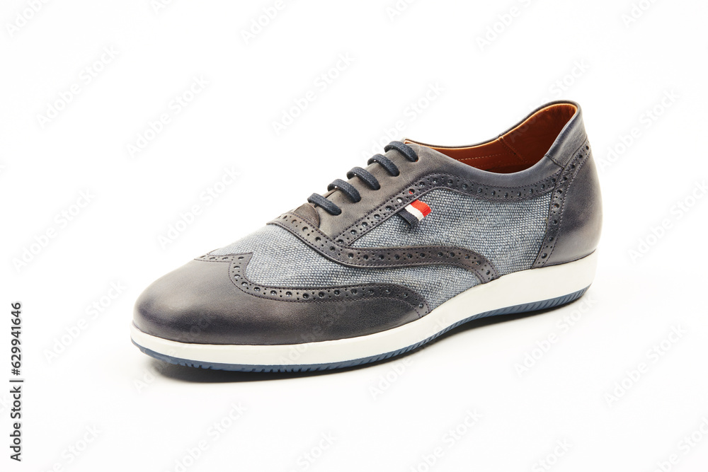 Handmade high quality Italian mens casual shoes on a white isolated background. Handmade high quality Italian mens casual shoes on a white isolated background.