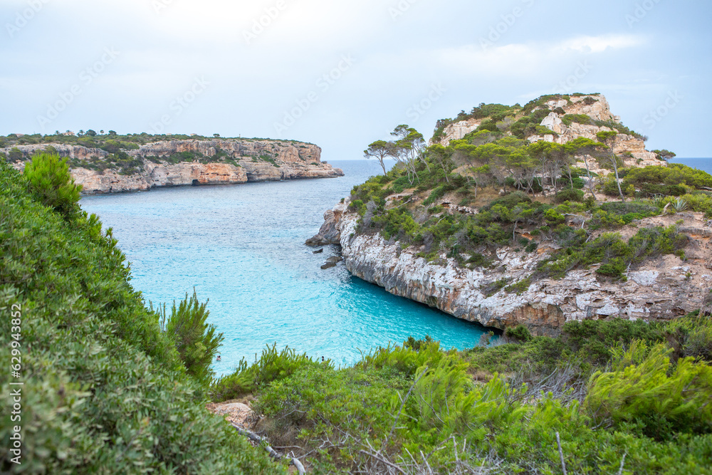 Calo des Moro, Majorca, Spain. Beautiful beach landscape, exotic tropical island nature, blue sea water, ocean waves, summer holidays vacation.