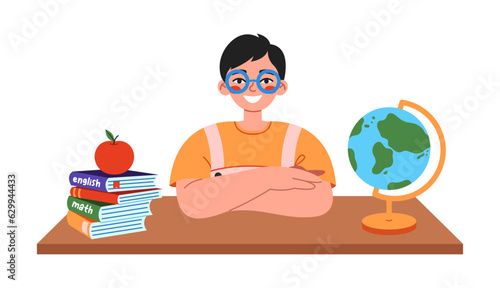 Cute school boy sitting at desk on lesson. Flat vector illustration on white background.