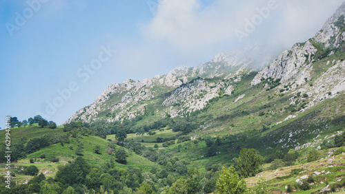 Mountain landscape with the clouds touching the peaks of the mountains