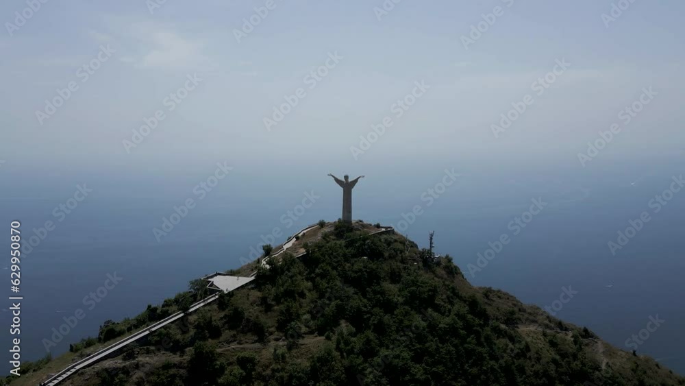 Aerial view of the Christ the Redeemer on top of the mountain at Maratea, Potenza, Basilicata, Italy. Aerial view of the Christ the Redeemer on top of the mountain at Maratea, Potenza, Basilicata, Italy.