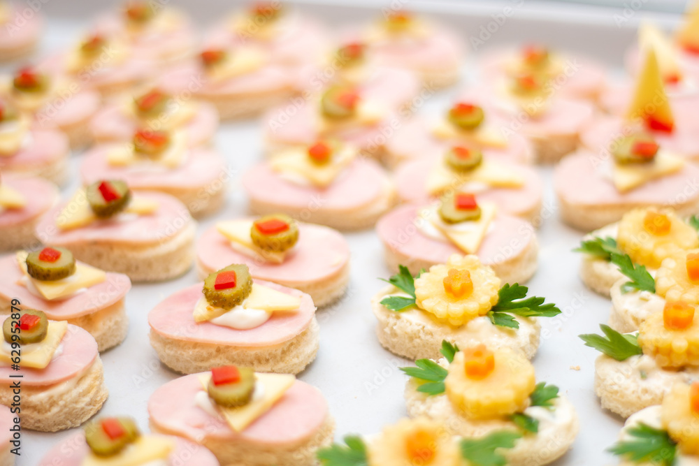 appetizers with ham, gherkin, cheese and red pepper
