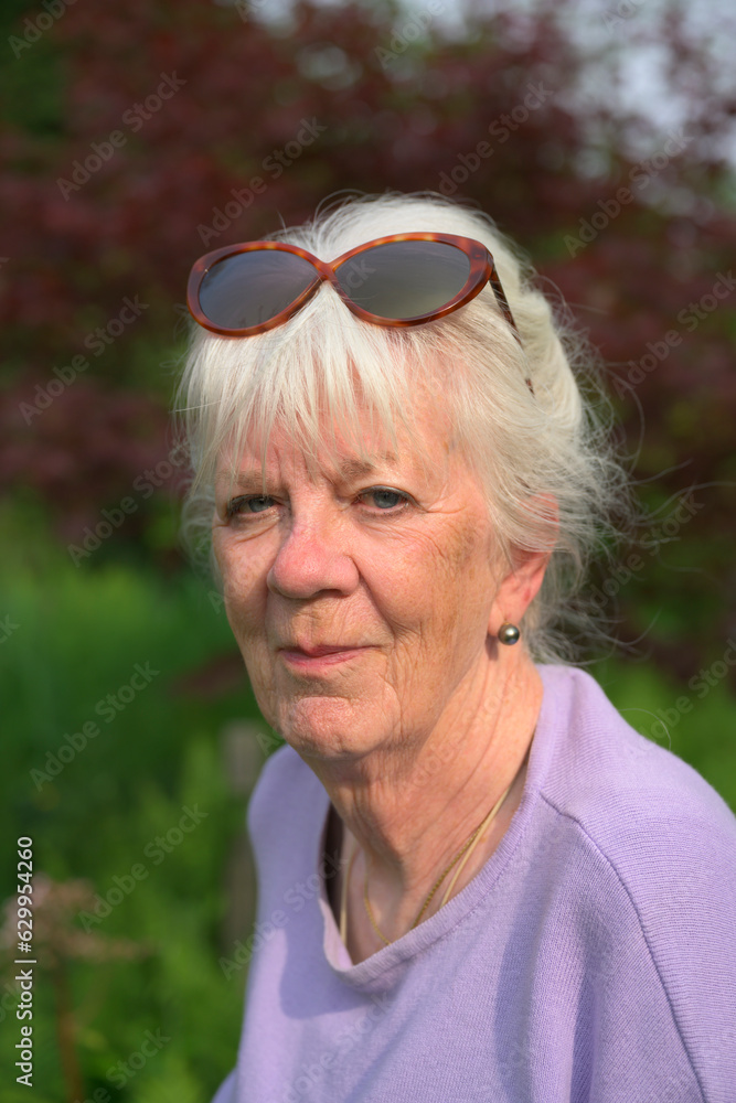 Netherlands, Zuid-Holland, Portrait of senior woman outdoors Netherlands, Zuid-Holland, Portrait of senior woman outdoors