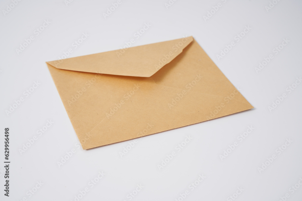 Old brown envelope from 1950' on a white background.