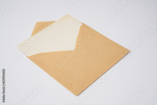 Old brown envelope from 1950' on a white background.