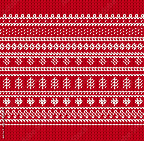 Xmas winter geometric texture with tree, heart, snowflakes. Knit seamless pattern. Christmas print. Knitted sweater background. Holiday fair isle traditional ornament. Vector illustration.