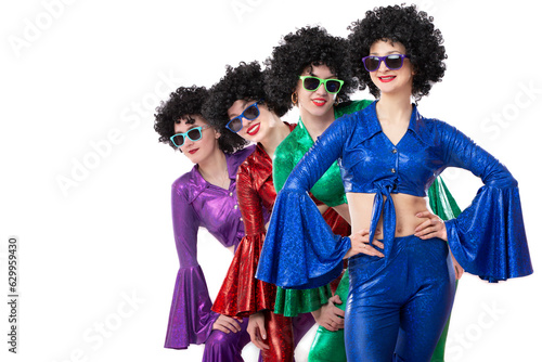 A group of girls in disco style and African wigs in colorful costumes on a white background.