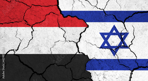 Flags of Yemen and Israel on cracked surface - politics, relationship concept