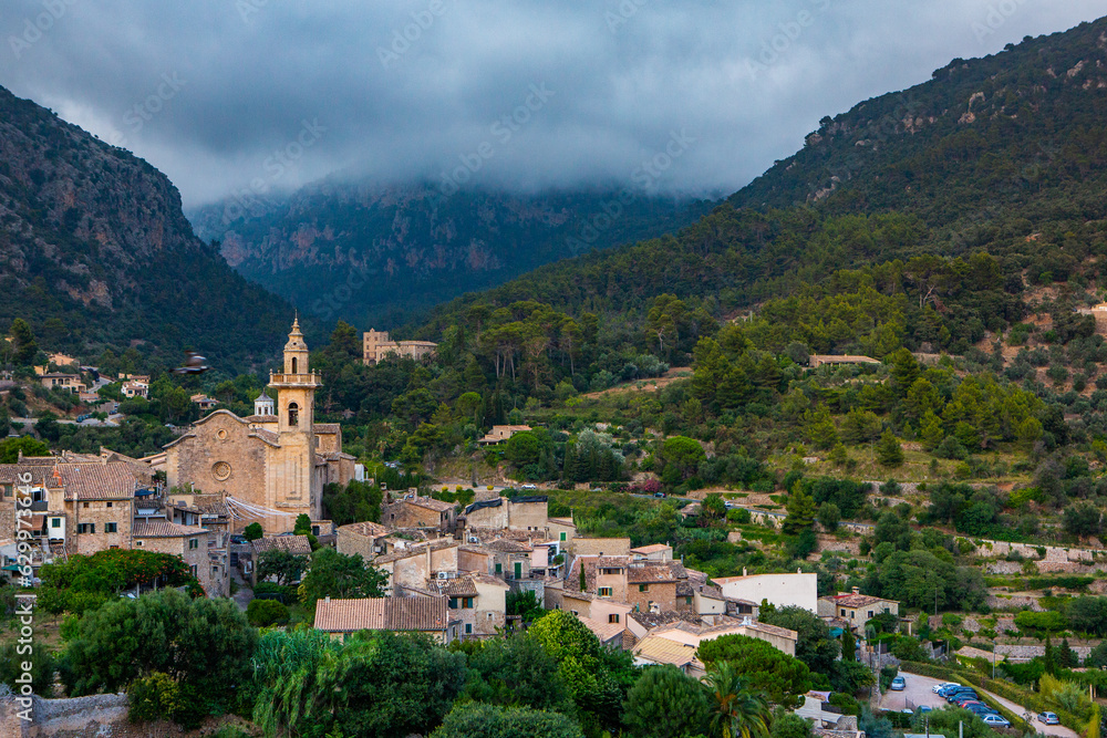 View of a medieval street of the picturesque Spanish-style village Valdemossa in Majorca or Mallorca island, Spain.