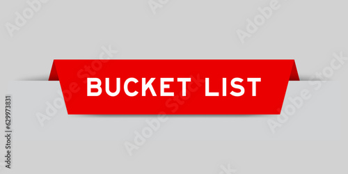 Red color inserted label with word bucket list on gray background