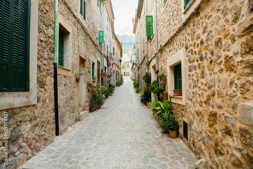 View of a medieval street of the picturesque Spanish-style village Valdemossa in Majorca or Mallorca island  Spain.