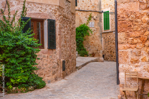 Fototapeta Naklejka Na Ścianę i Meble -  View of a medieval street of the picturesque Spanish-style village Valdemossa in Majorca or Mallorca island, Spain.