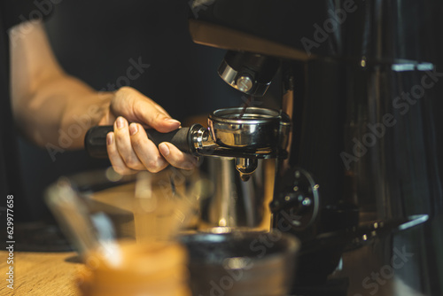 The process of making coffee on a coffee machine. Espresso machine. barista Fragrant morning coffee. Caffeine. Addiction to coffee. © Anastasia
