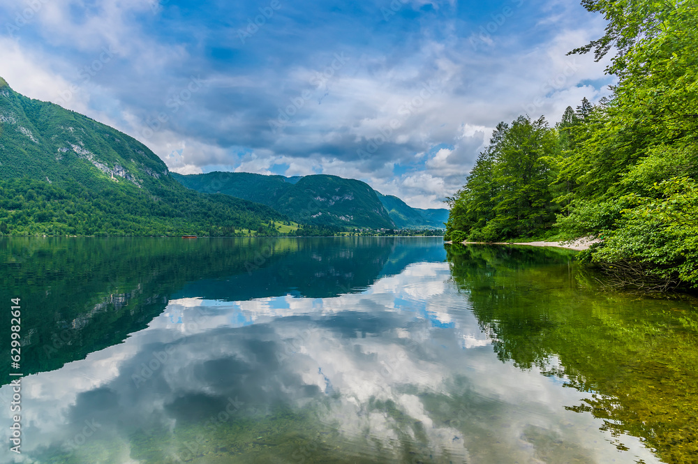 A view from the southern shore across lake Bohinj, Slovenia in summertime