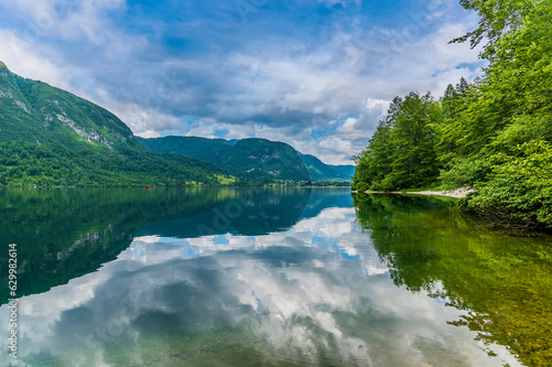 A view from the southern shore across lake Bohinj, Slovenia in summertime © Nicola