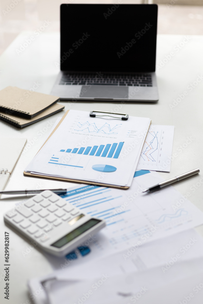 Finance and accounting paperwork on office desk. Finance and accounting paperwork on office desk.